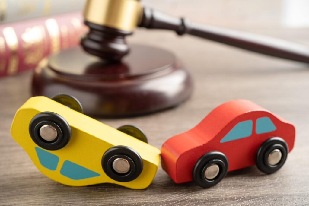 Hammer gavel judge with car vehicle accident