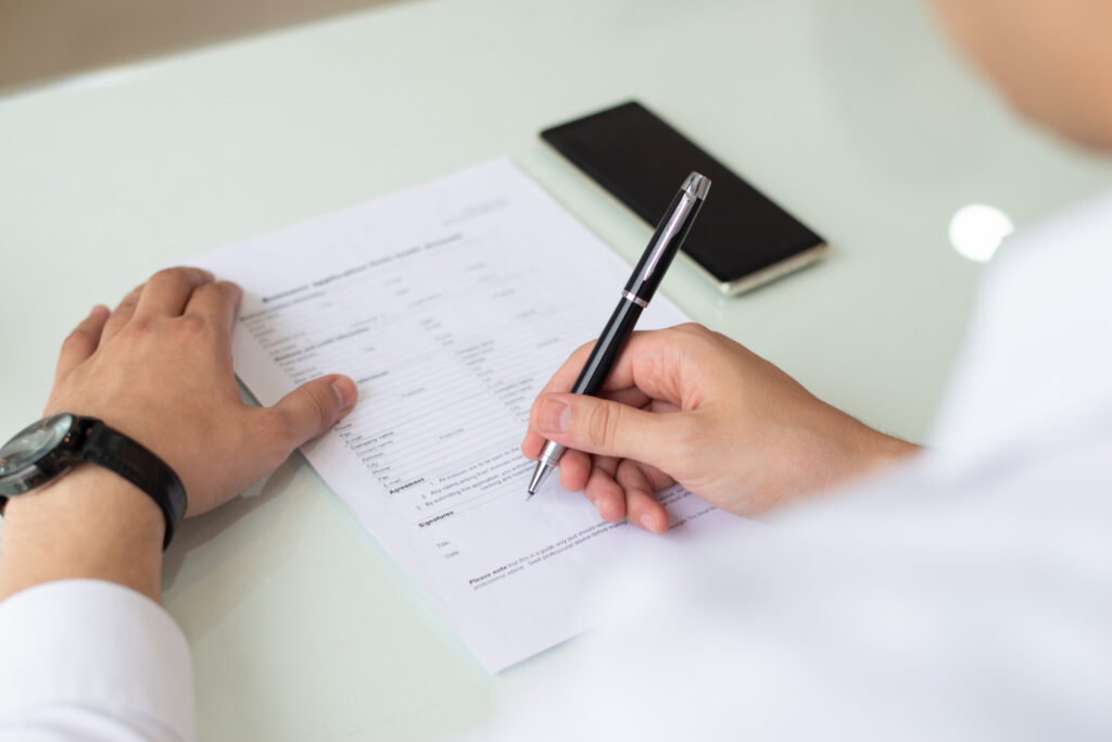 Man filling a form