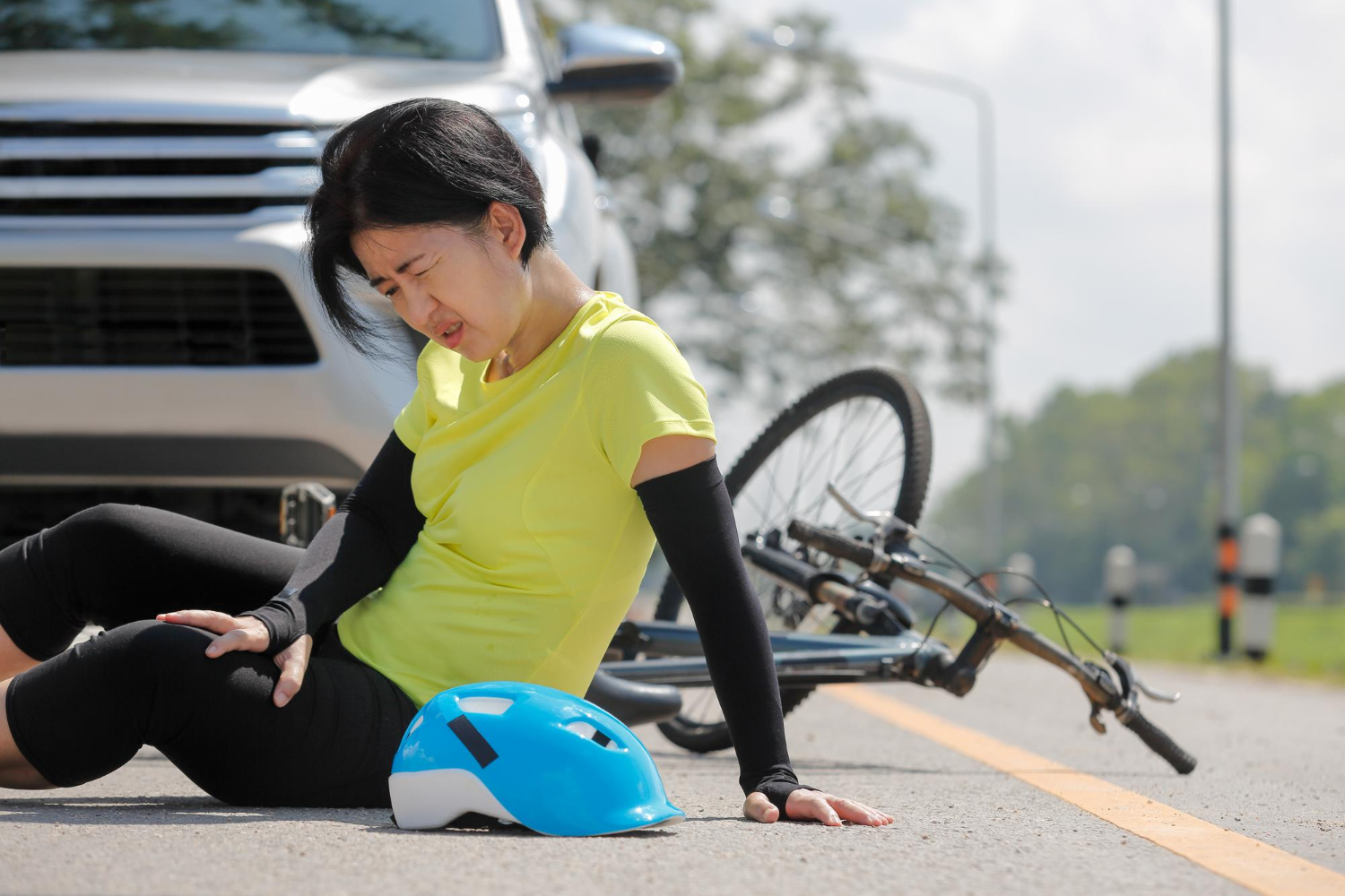 Bike rider hit by car