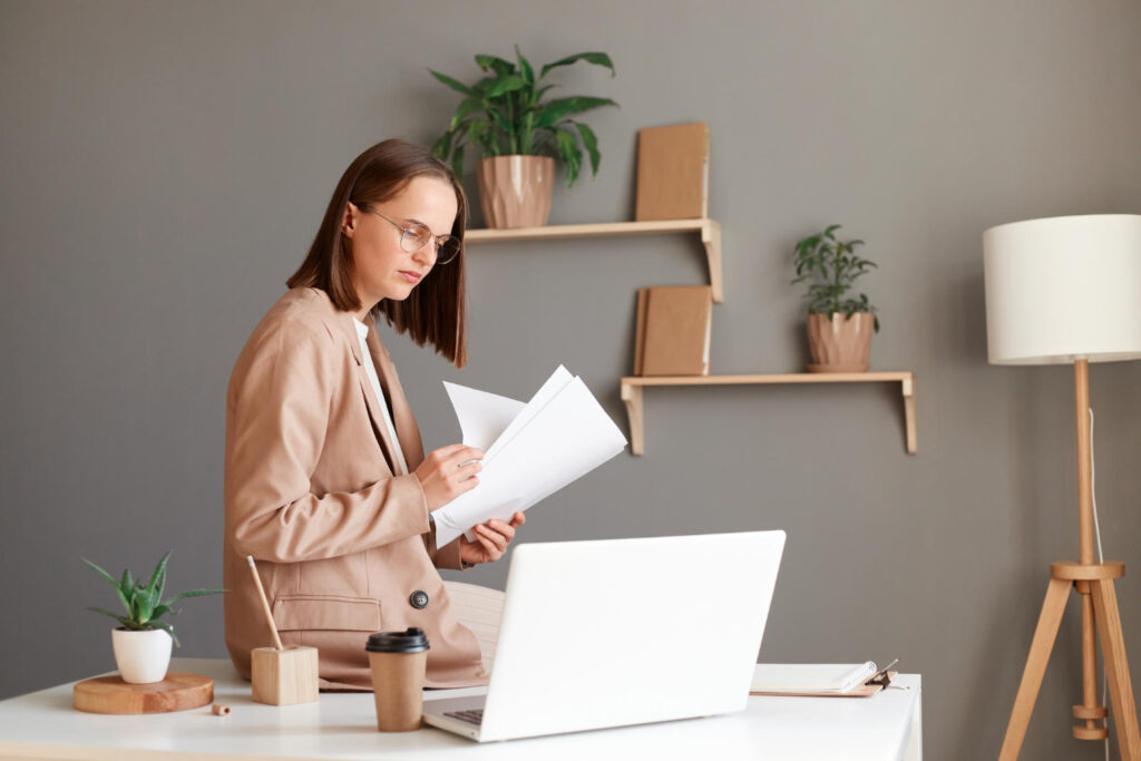 Woman looking at spousal support documents