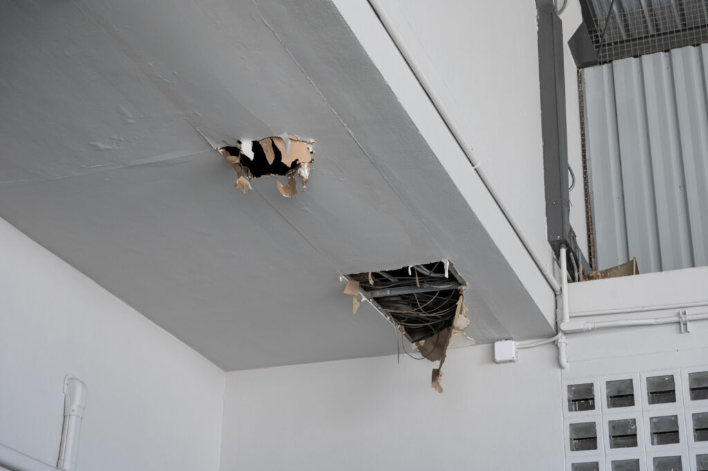 Ceiling panel damaged and crack hole