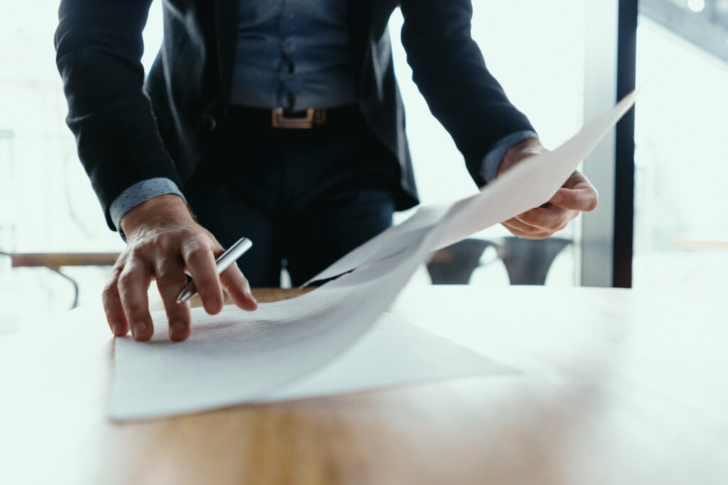 Man signing documents